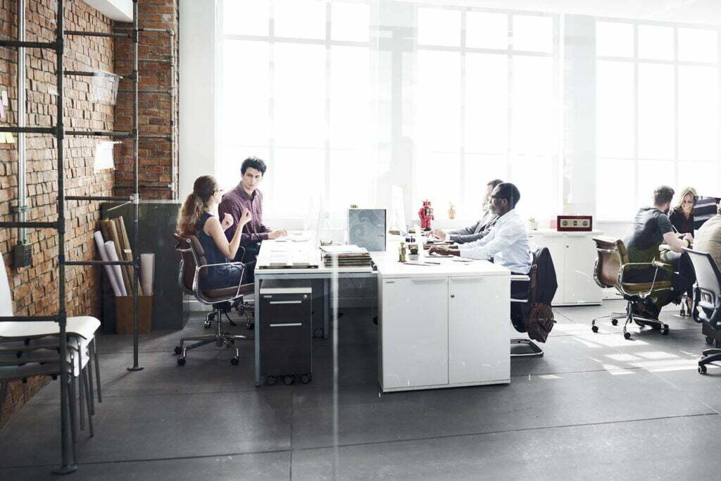 a modern office with employees working