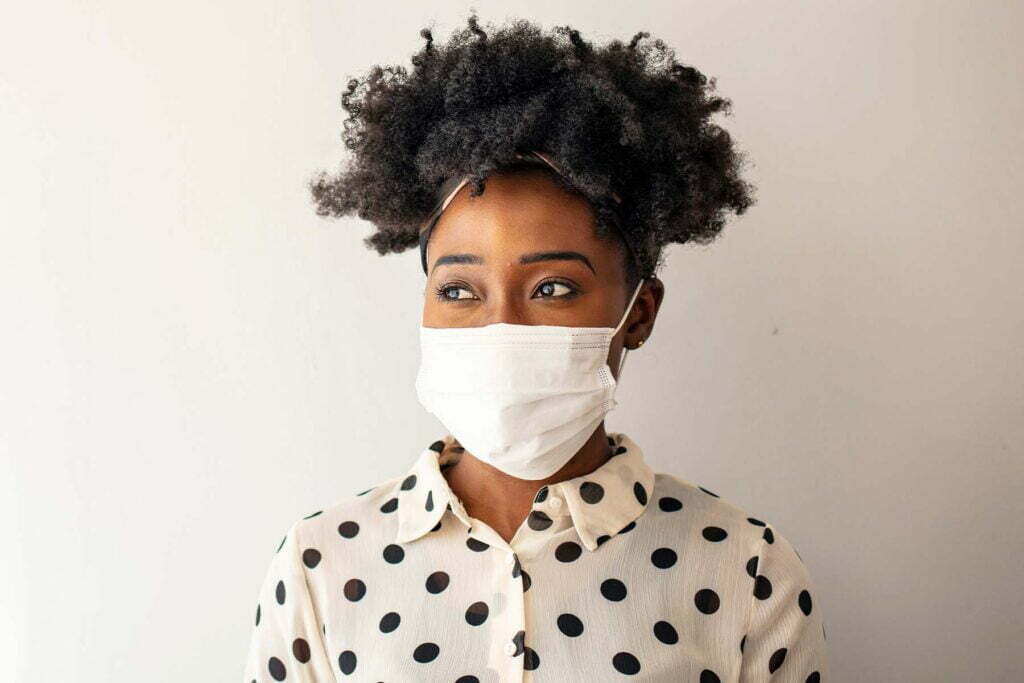 young lady with a face mask on
