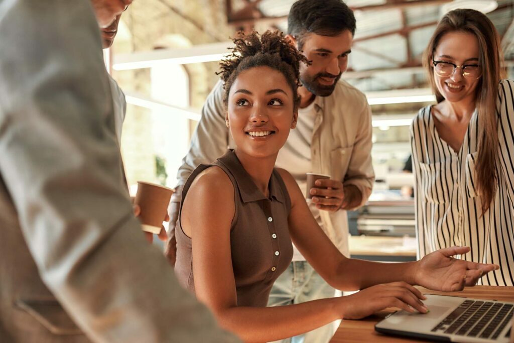 happy group of Gen Z workers