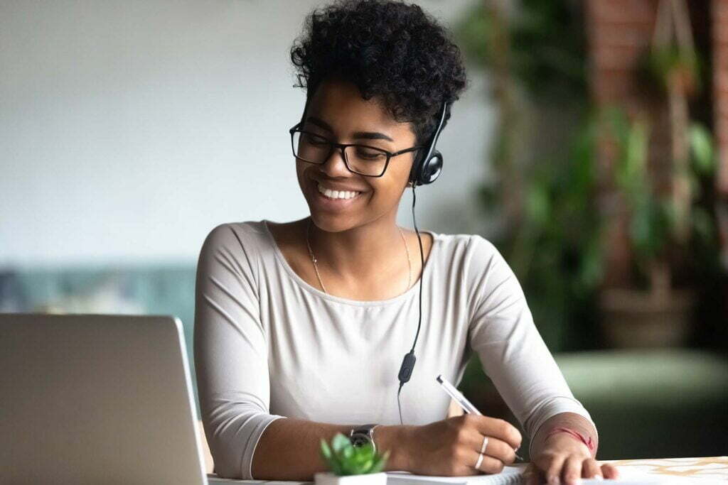 happy person at computer on google my business