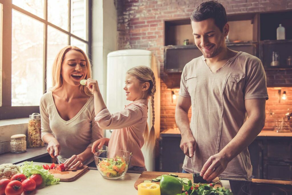 happy family cooking heart healthy meal