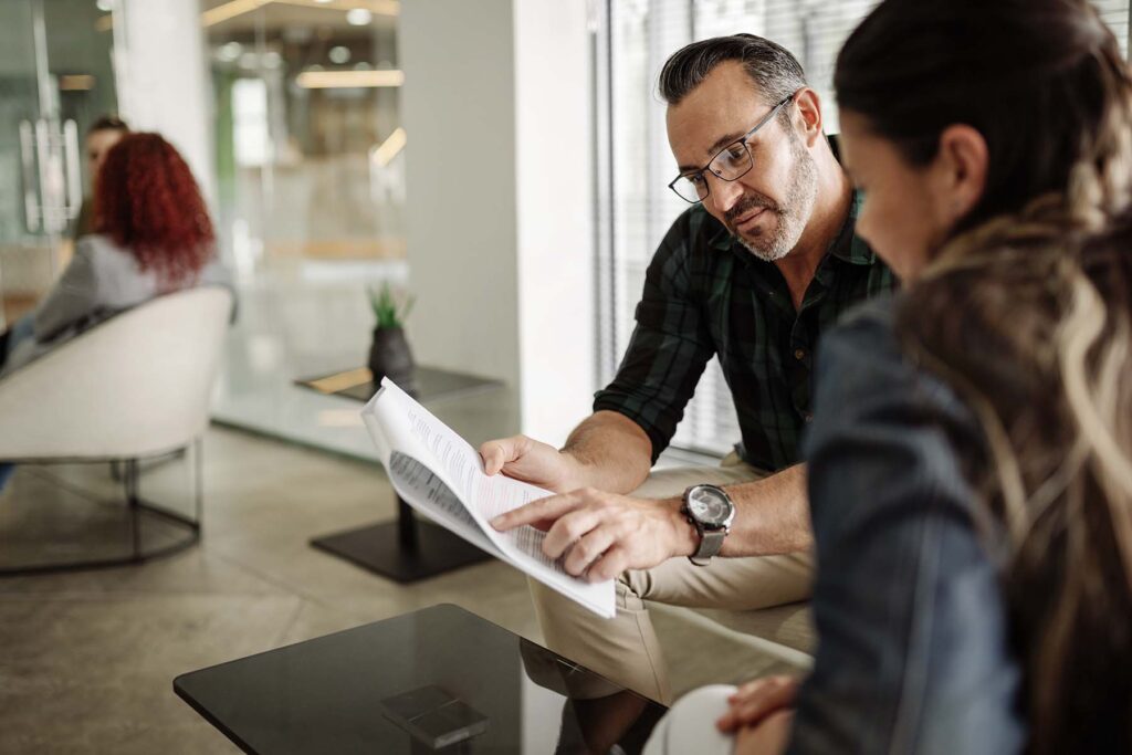 two people going over a form