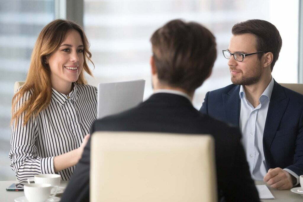 three coworkers talking about Roth Contributions