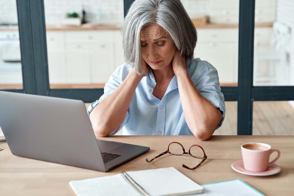 burnout woman on her laptop
