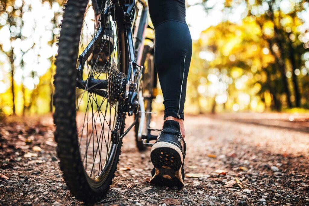 a shot of a person on a bike path