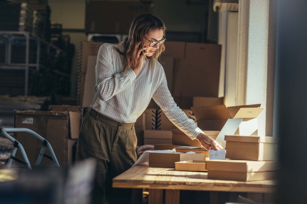 a business owner looking over her supply chain