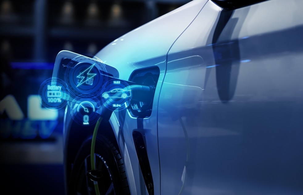 Electric vehicle parked outside a business, representing the upcoming 2025 tax credit deadline